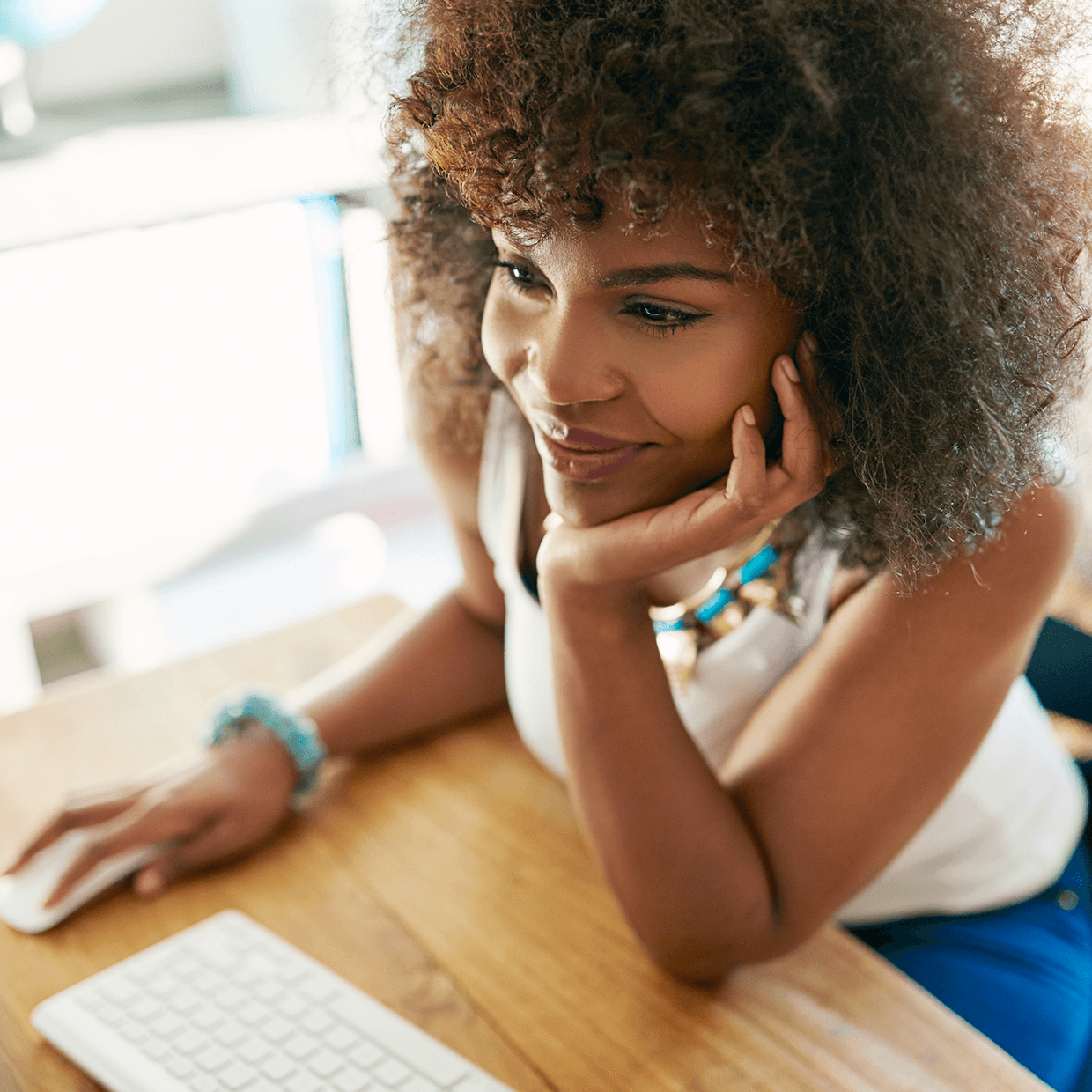 Woman at a computer.